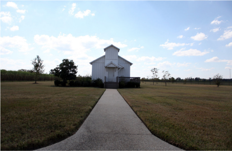 "(Renovated church on Mr. Gaines’s property in Louisiana; he attended school in this building as a youth.) "