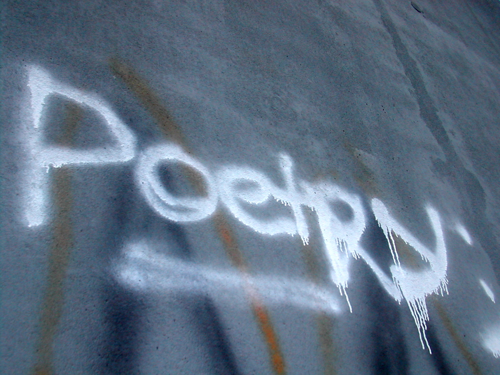 "Graffitti spelling poetry"