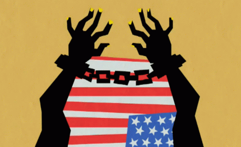 "image of black hands held captive in front of a U.S. flag"