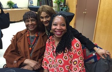 "an image of Louise Meriwether and current members of the Harlem Writers Guild"