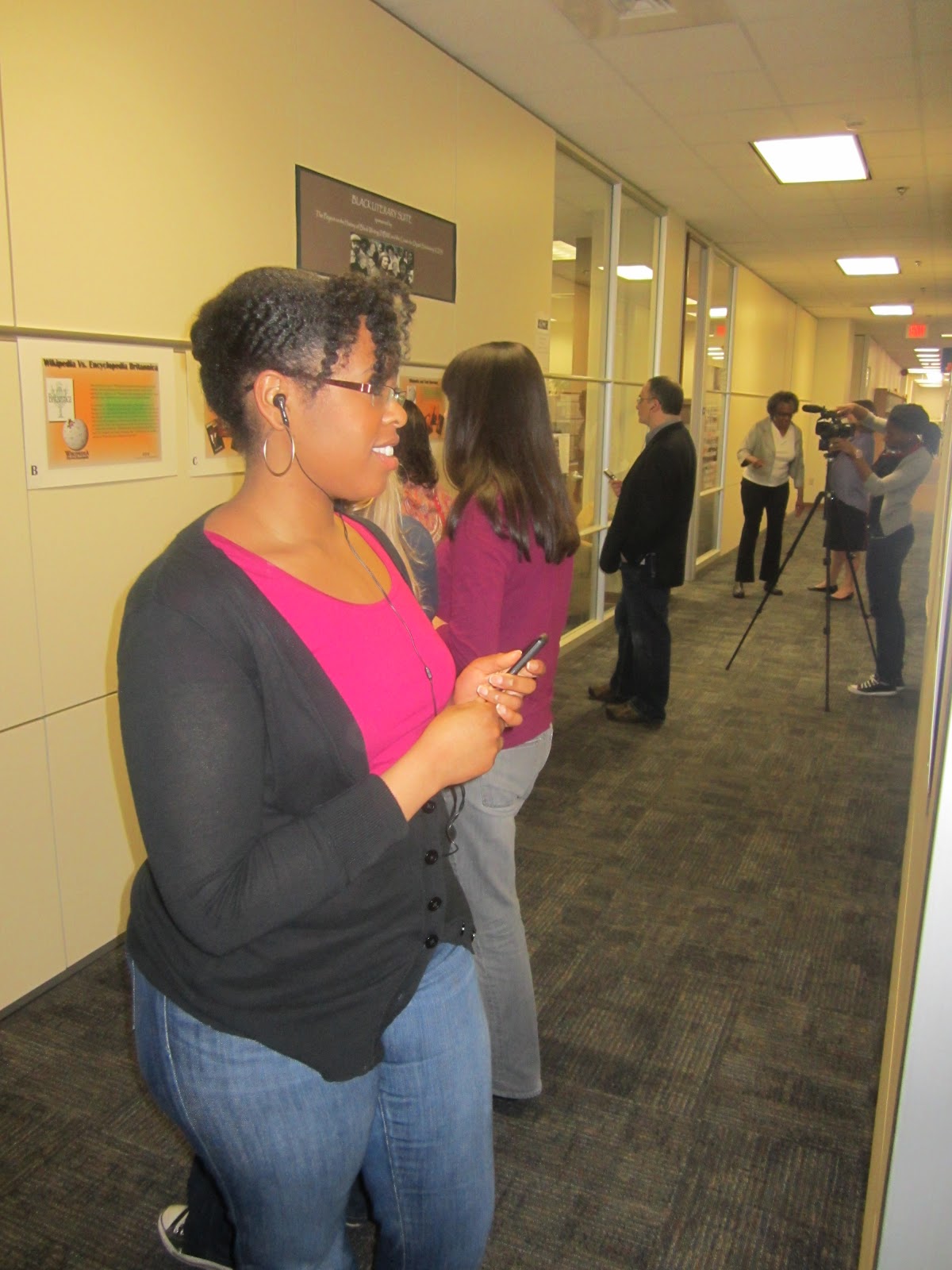 "A woman looking at the BLS display"