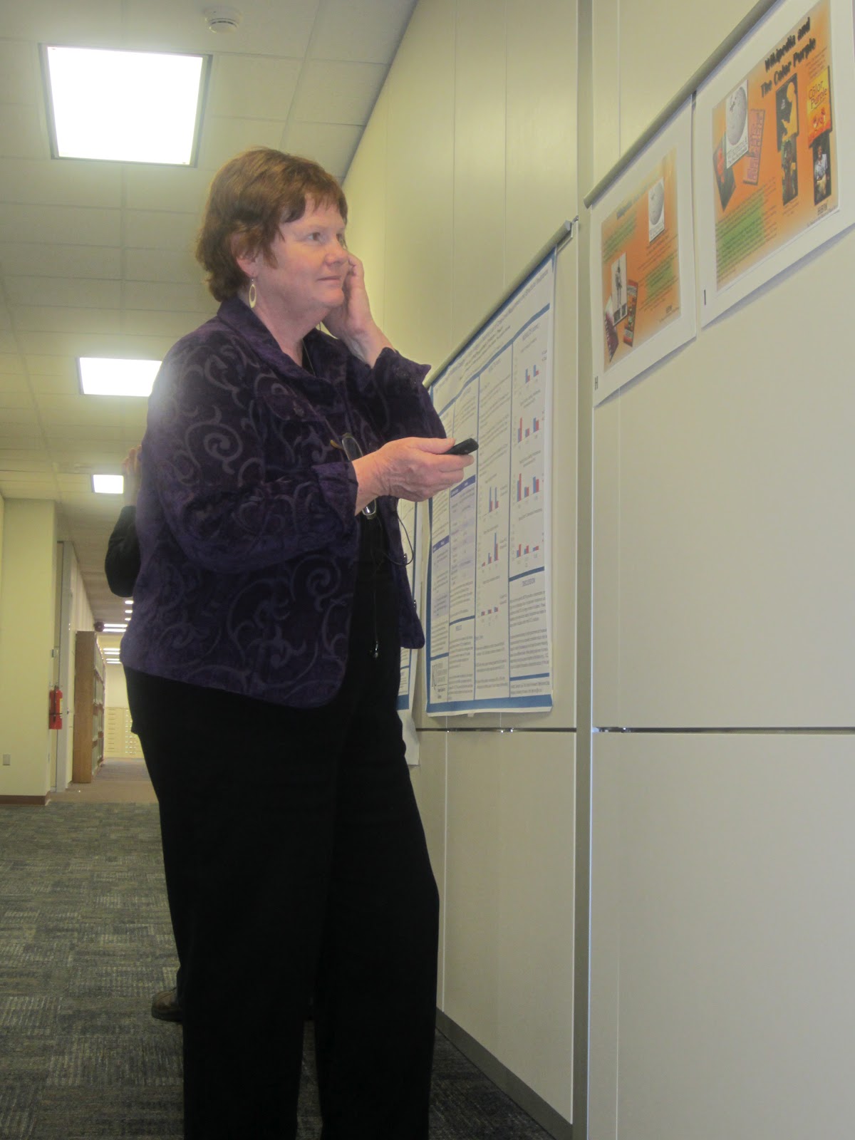 "A woman looking at the BLS displays"