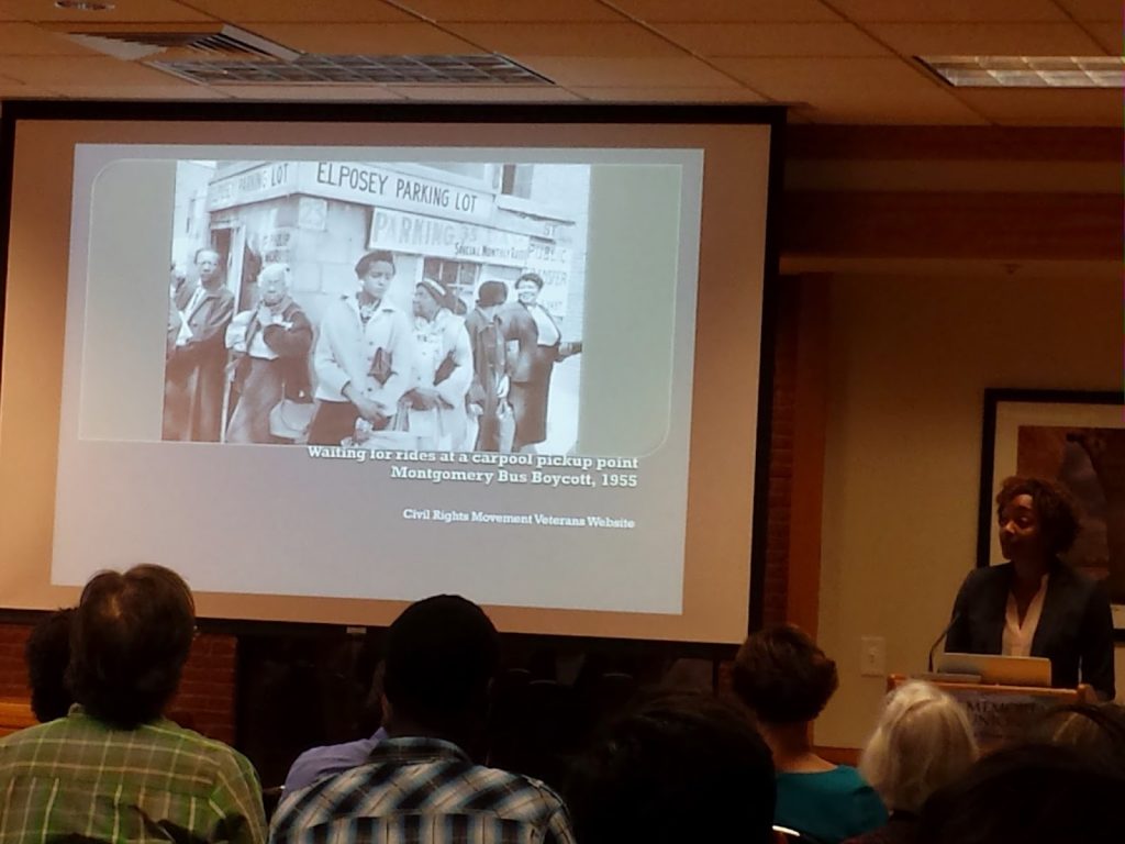 "Picture of the Montgomery Bus Boycott 1955 being projected in a powerpoint presentation"