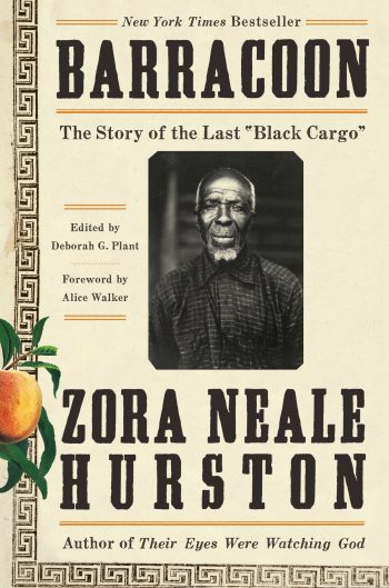Cover of "Barracoon" by Zora Neale Hurston, featuring a black and white photograph of an elderly man with a hat and glasses. The title is written in bold white letters at the top, and the author's name is written in smaller white letters at the bottom.