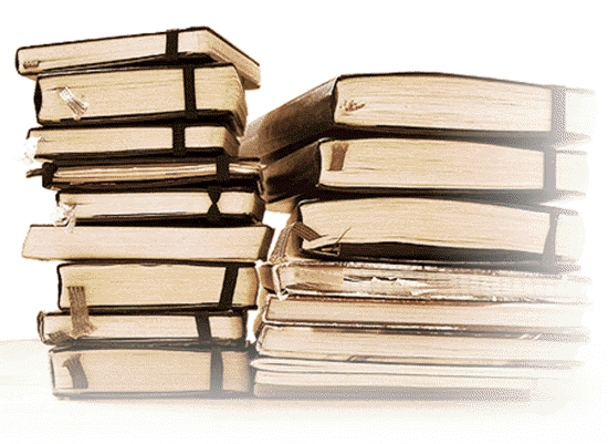 "Two stacks of books piled up on top of each other"