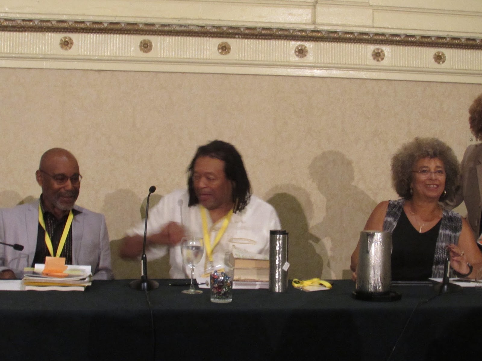 Panel consisting of Angela Davis, John McCluskey, and Quincy Troupe from right to left