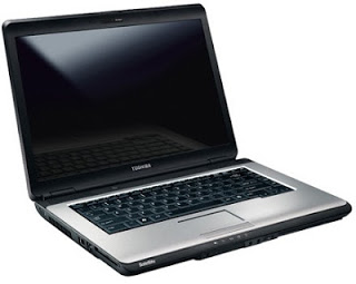 "A black Toshiba Satellite L300 laptop"