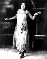 "Black and white image of a woman dancing"