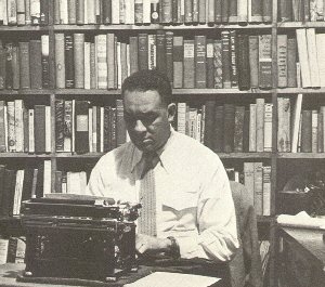 "John Steinbeck using a typewriter"